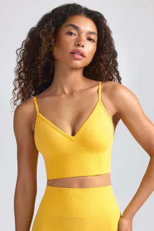 Define Luxe V-Neck Sports Bra in Golden Yellow