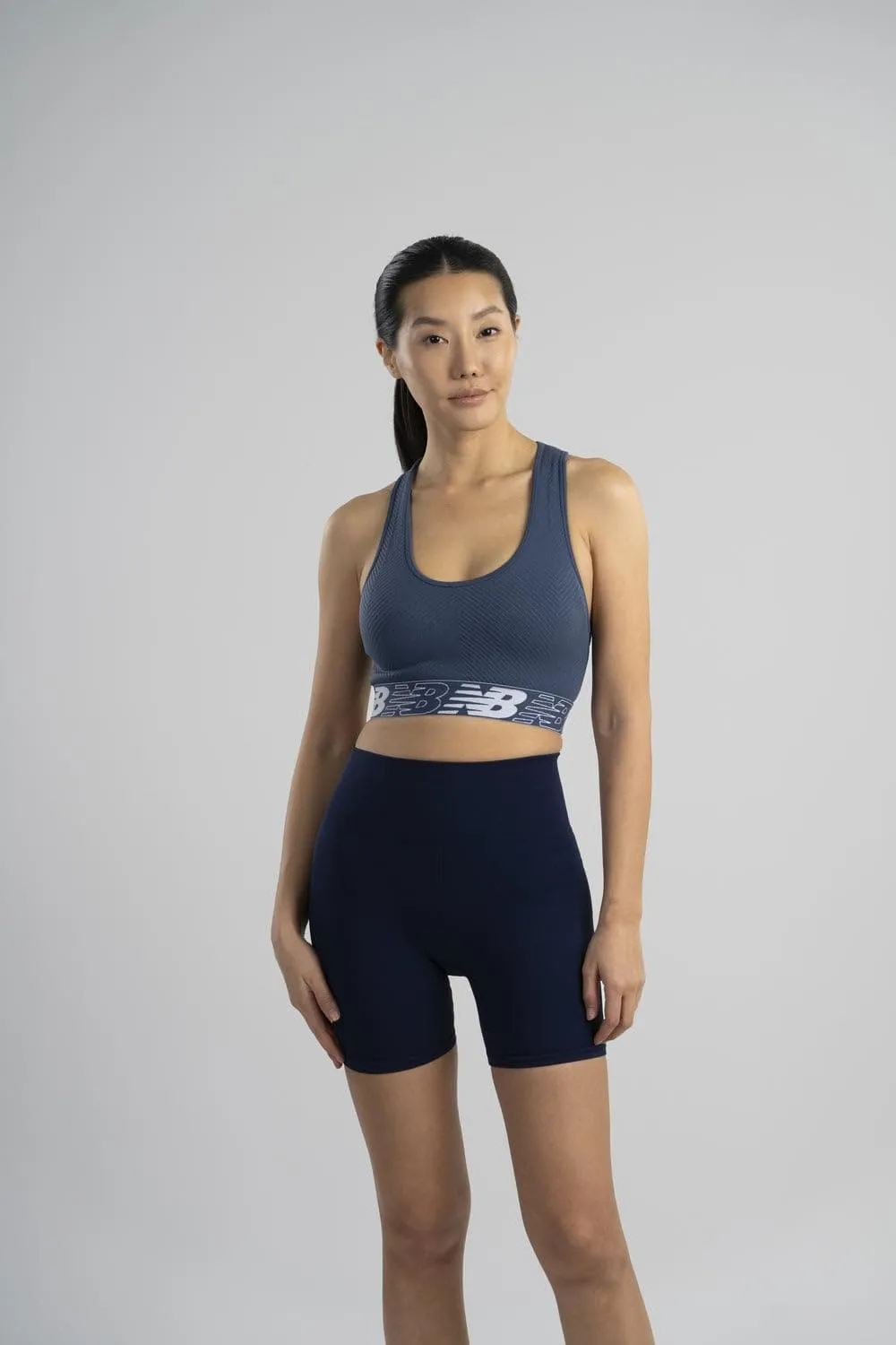 New Balance Womens Seamless Wirefree, Racerback Sports Bra with Removable Pads, Bottom Band with Logo, Camo Magnet