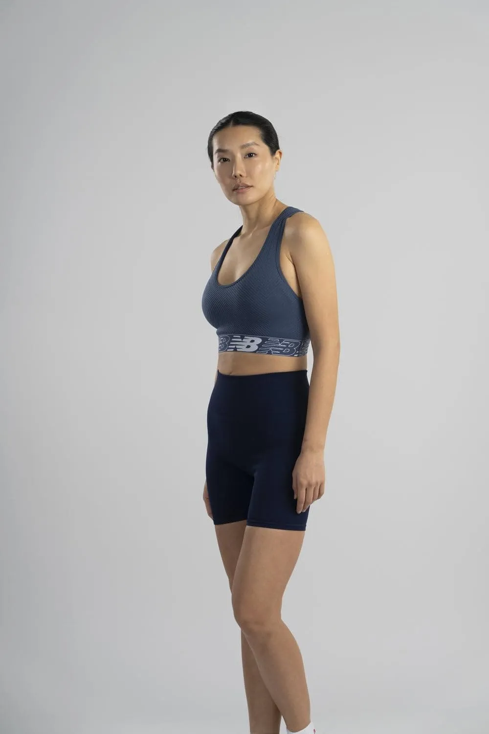 New Balance Womens Seamless Wirefree, Racerback Sports Bra with Removable Pads, Bottom Band with Logo, Camo Magnet
